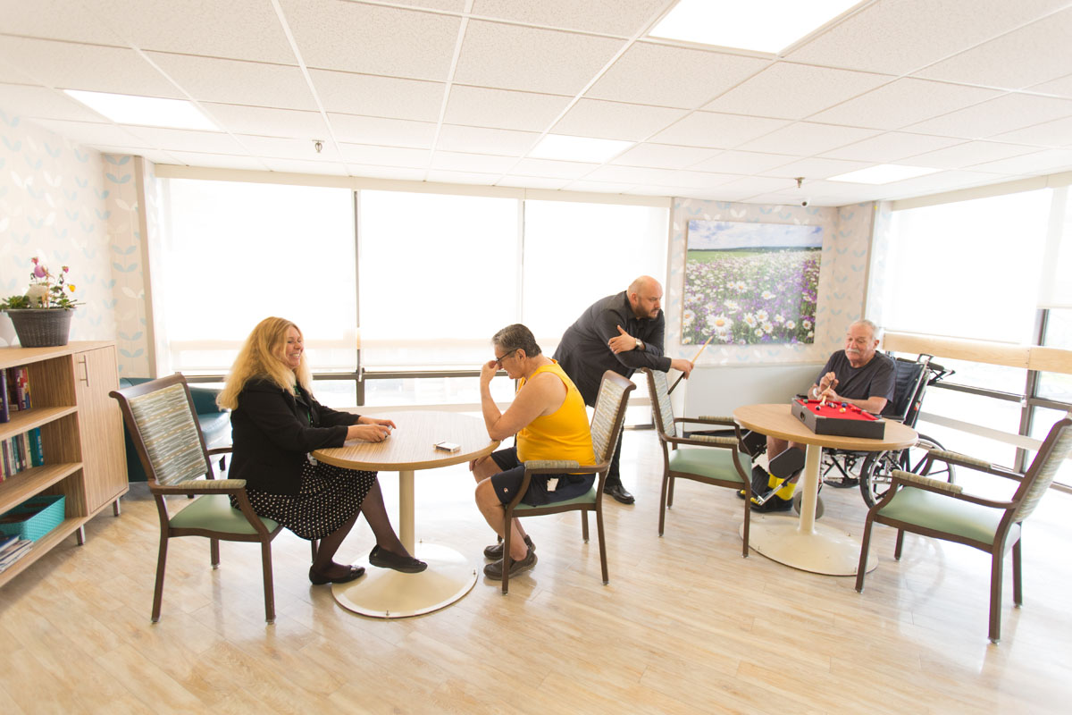 Recreation room with people playing games